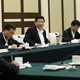 Xi, looking breezy, addresses government officials and businessmen in Guangzhou